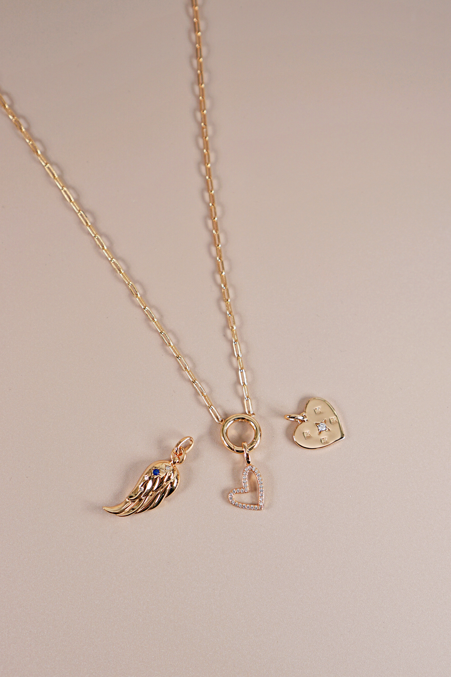 Gold Starry Heart Pendant featuring a heart shape adorned with delicate stars, symbolizing self-love and individuality.