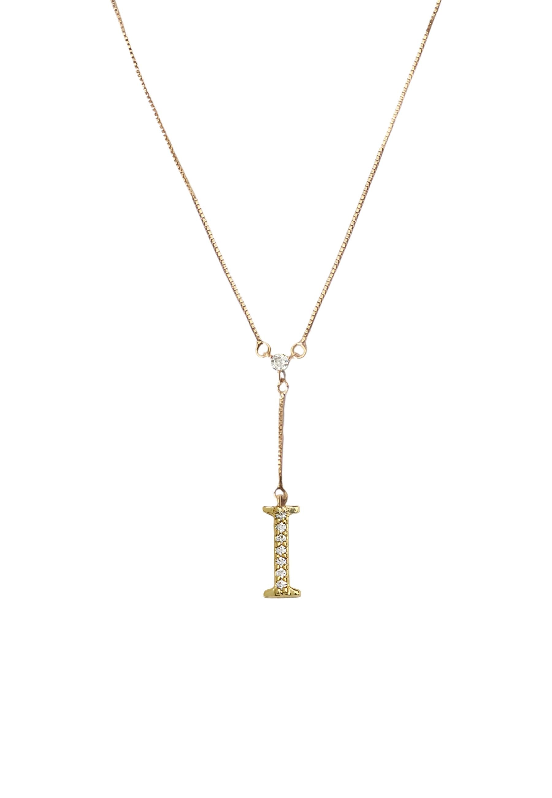 Elegant Golden Alphabet Necklace with zirconia stones, showcasing a personalized initial, perfect for layering or gifting.