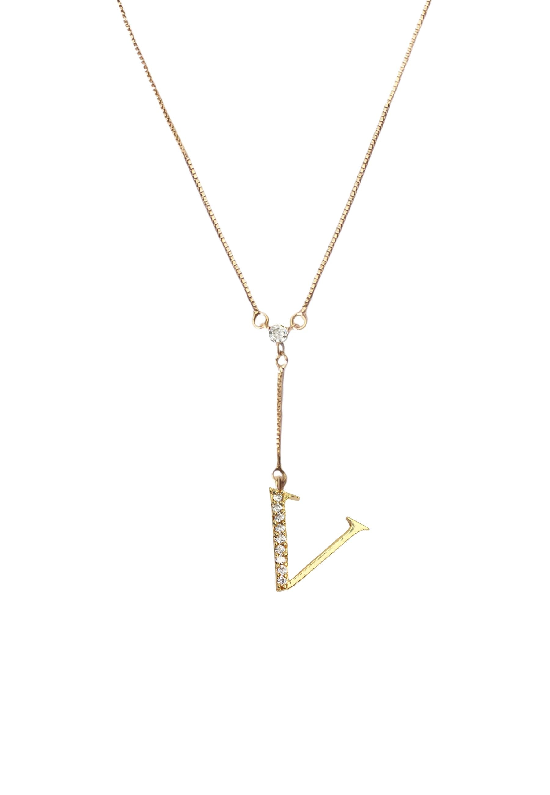 Elegant Golden Alphabet Necklace with zirconia stones, showcasing a personalized initial, perfect for layering or gifting.