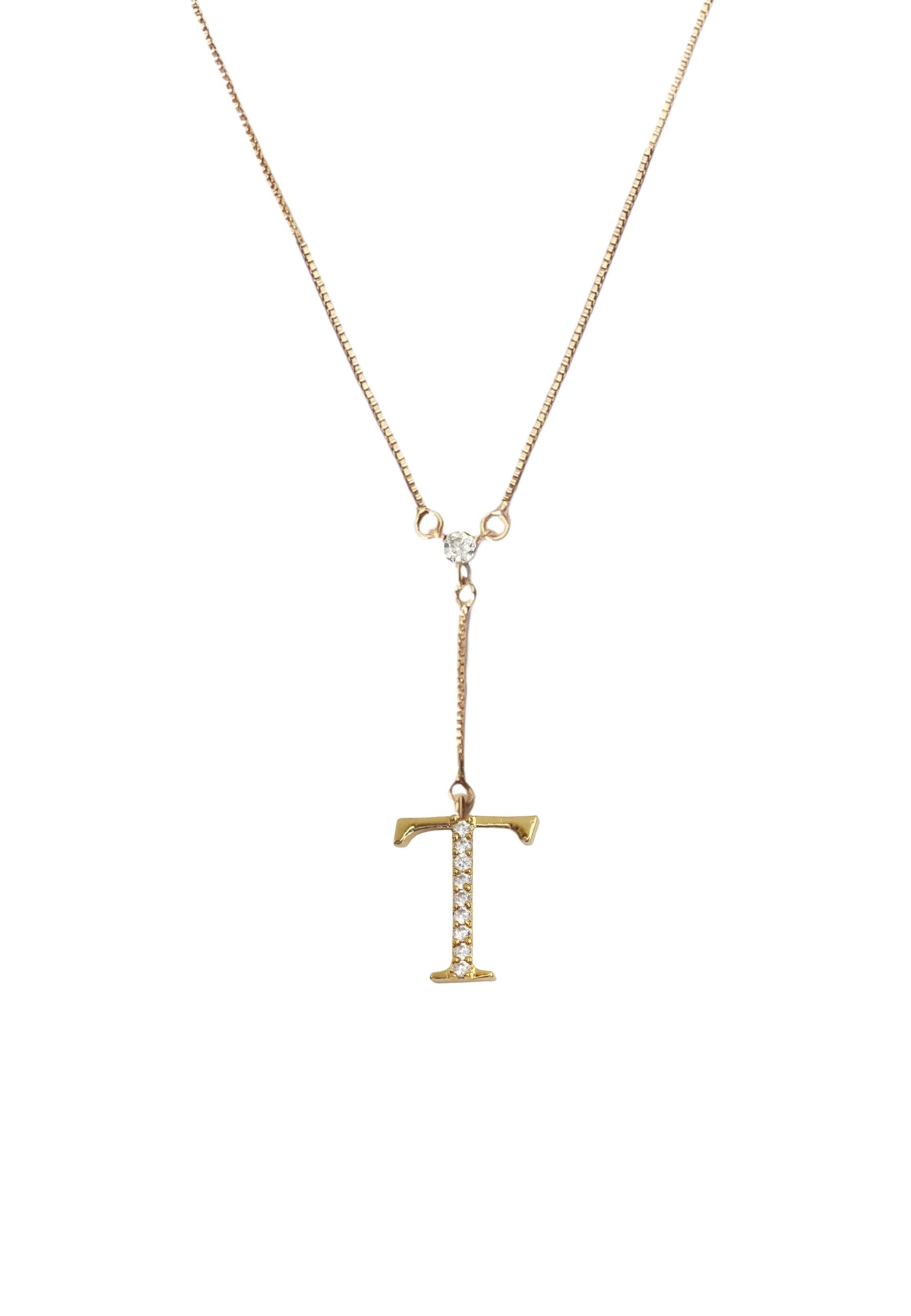 Elegant Golden Alphabet Necklace with zirconia stones, showcasing a personalized initial, perfect for layering or gifting.