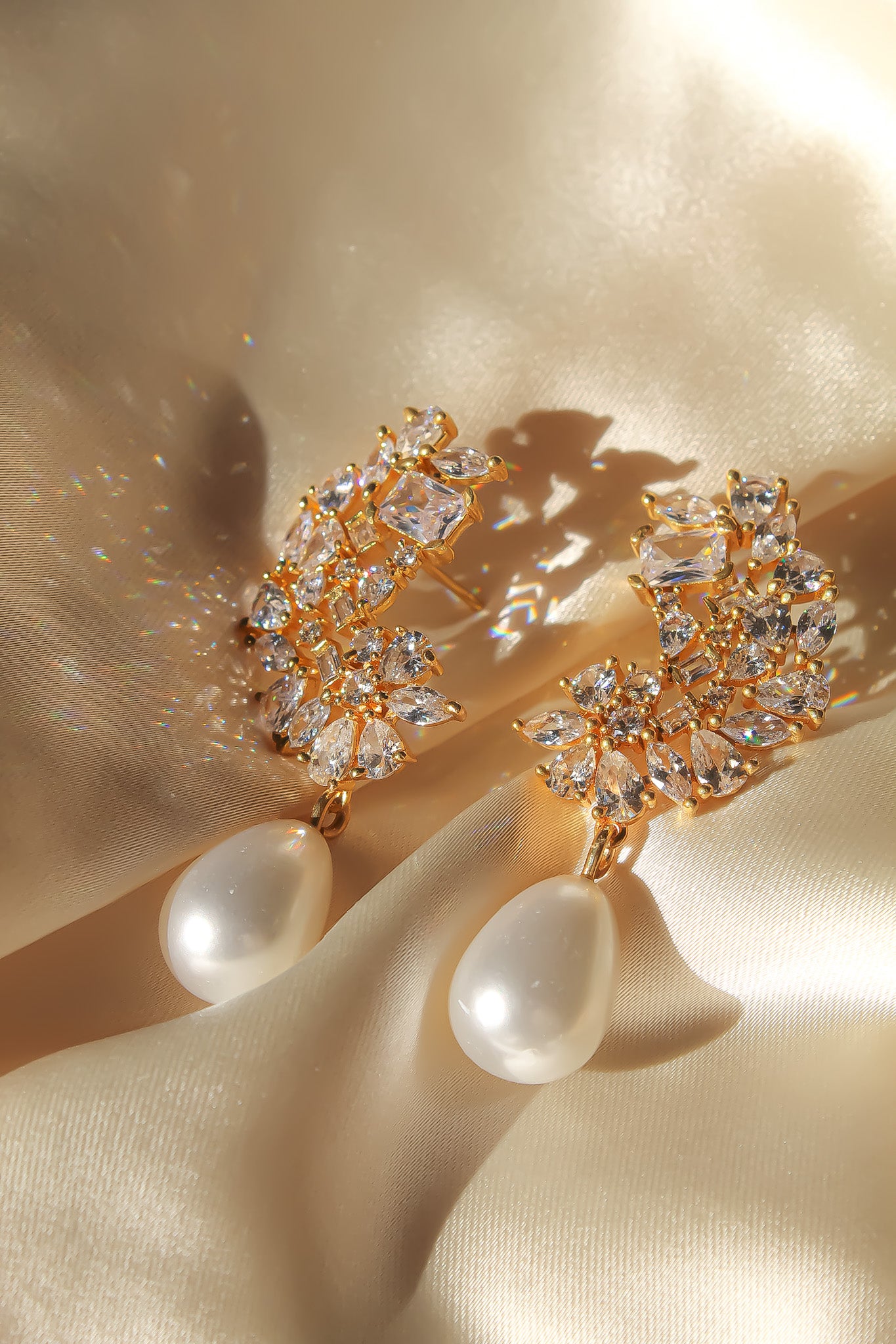 Elegant Golden Frosty Pearl Earrings featuring zirconia stones and a shiny resin pearl, perfect for pierced ears.