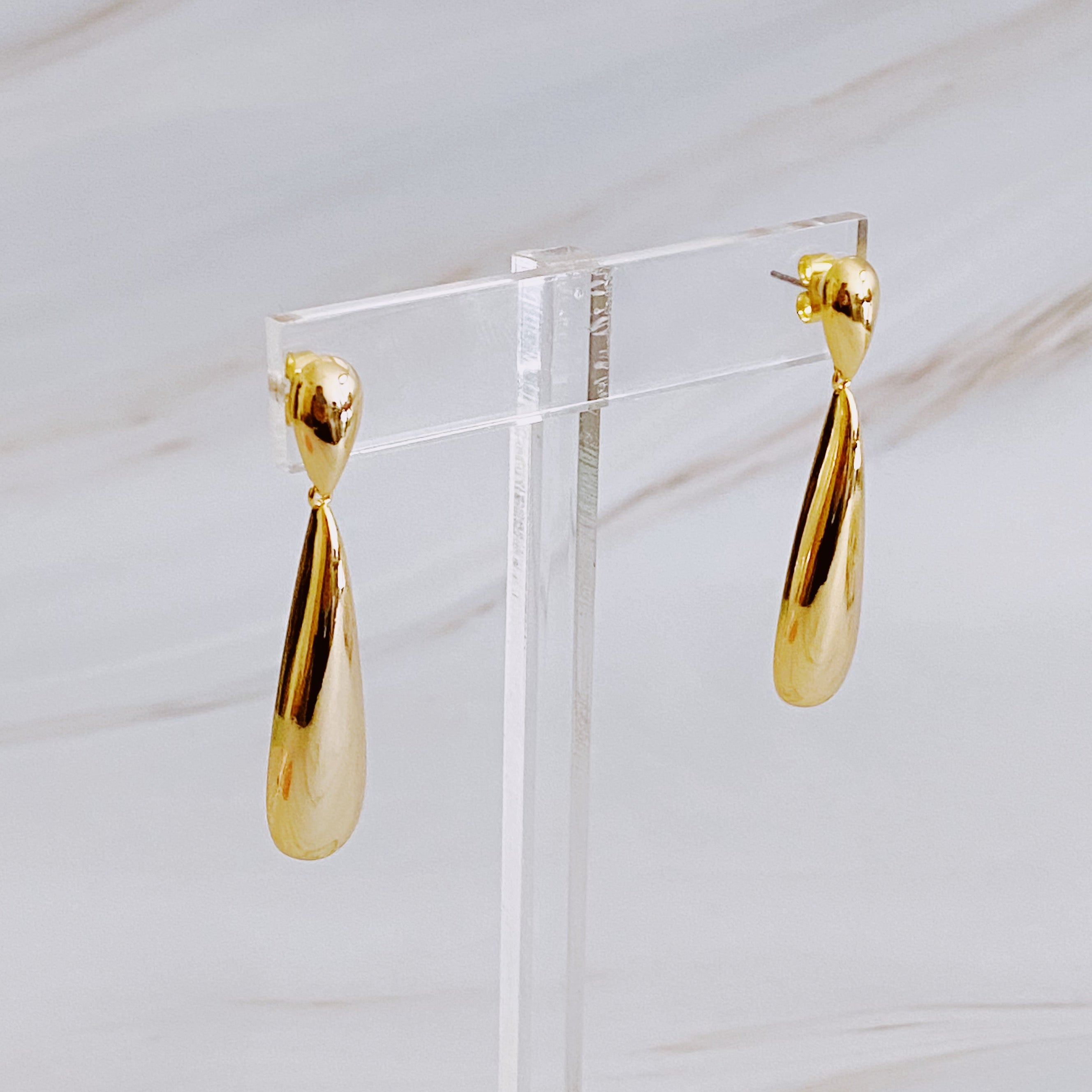 Elegant Golden Object Double Tier Earrings with a sophisticated design, featuring a 2-inch drop length and made from 18k gold plated brass.