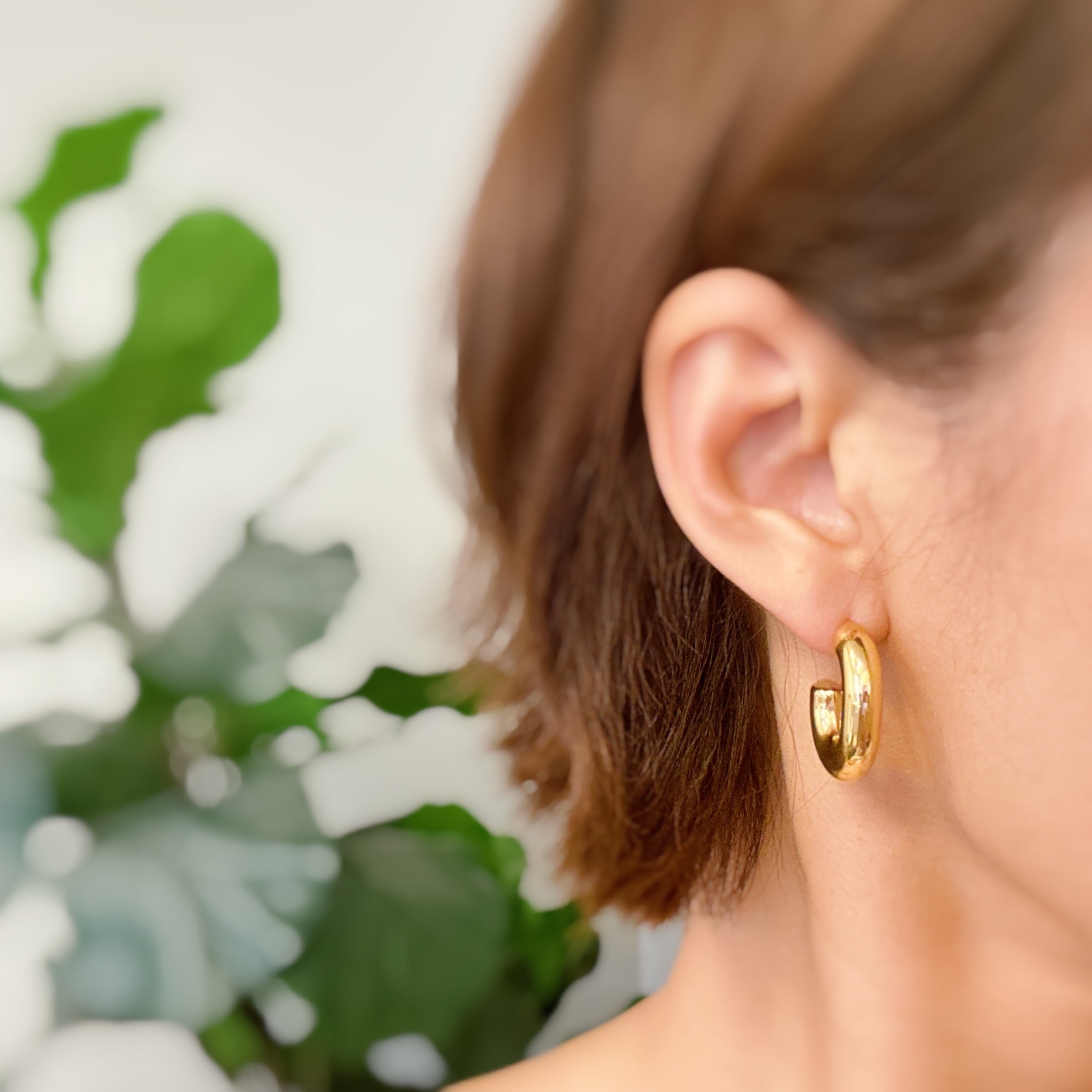 Elegant Golden Object Oval Hoop Earrings in a modern design, crafted from 18k gold plated stainless steel.