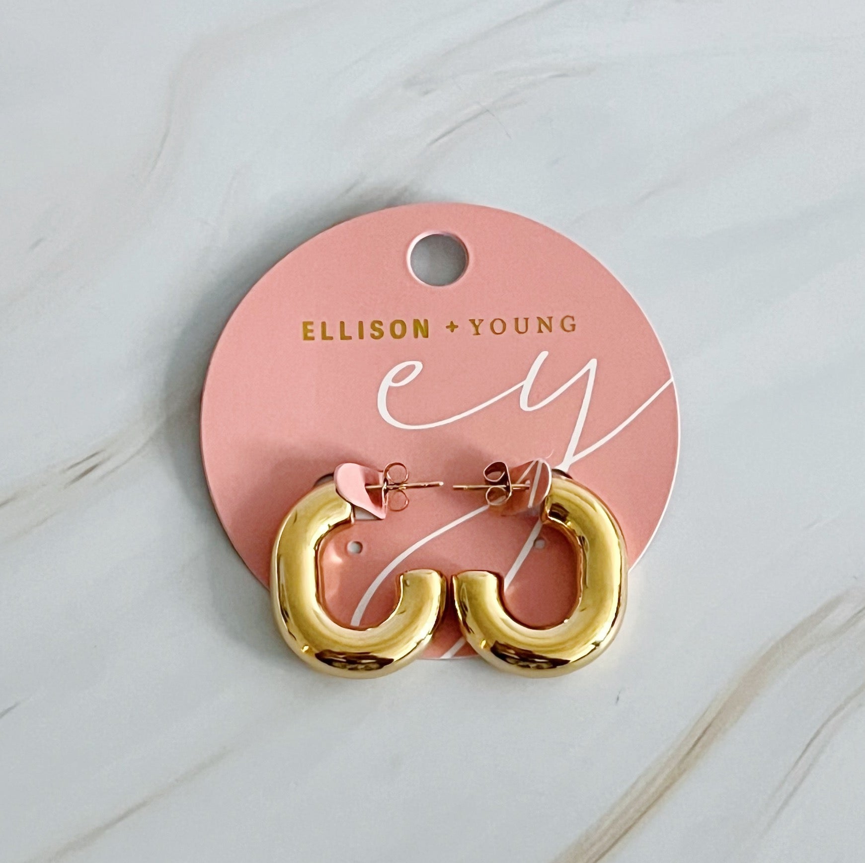 Elegant Golden Object Oval Hoop Earrings in a modern design, crafted from 18k gold plated stainless steel.