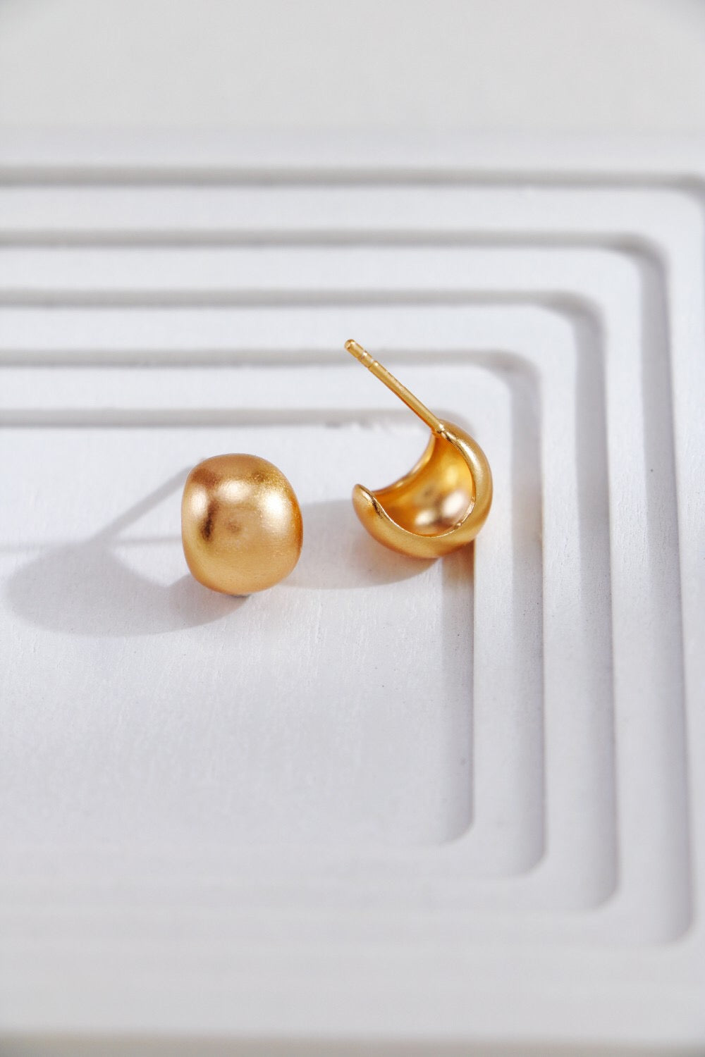 Gold-plated brushed spherical stud earrings, handmade with 18ct gold plating on sterling silver, showcasing a unique brushed texture.