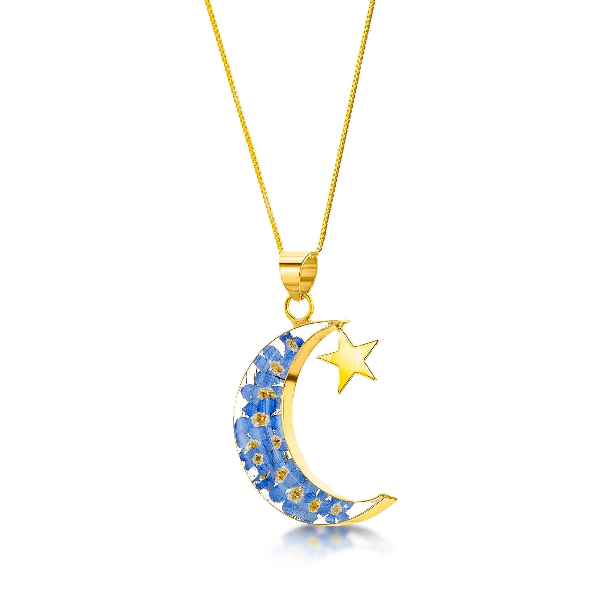 Gold-Plated Sterling Silver Moon & Star Pendant featuring real forget-me-not flowers, elegantly designed for a celestial look.