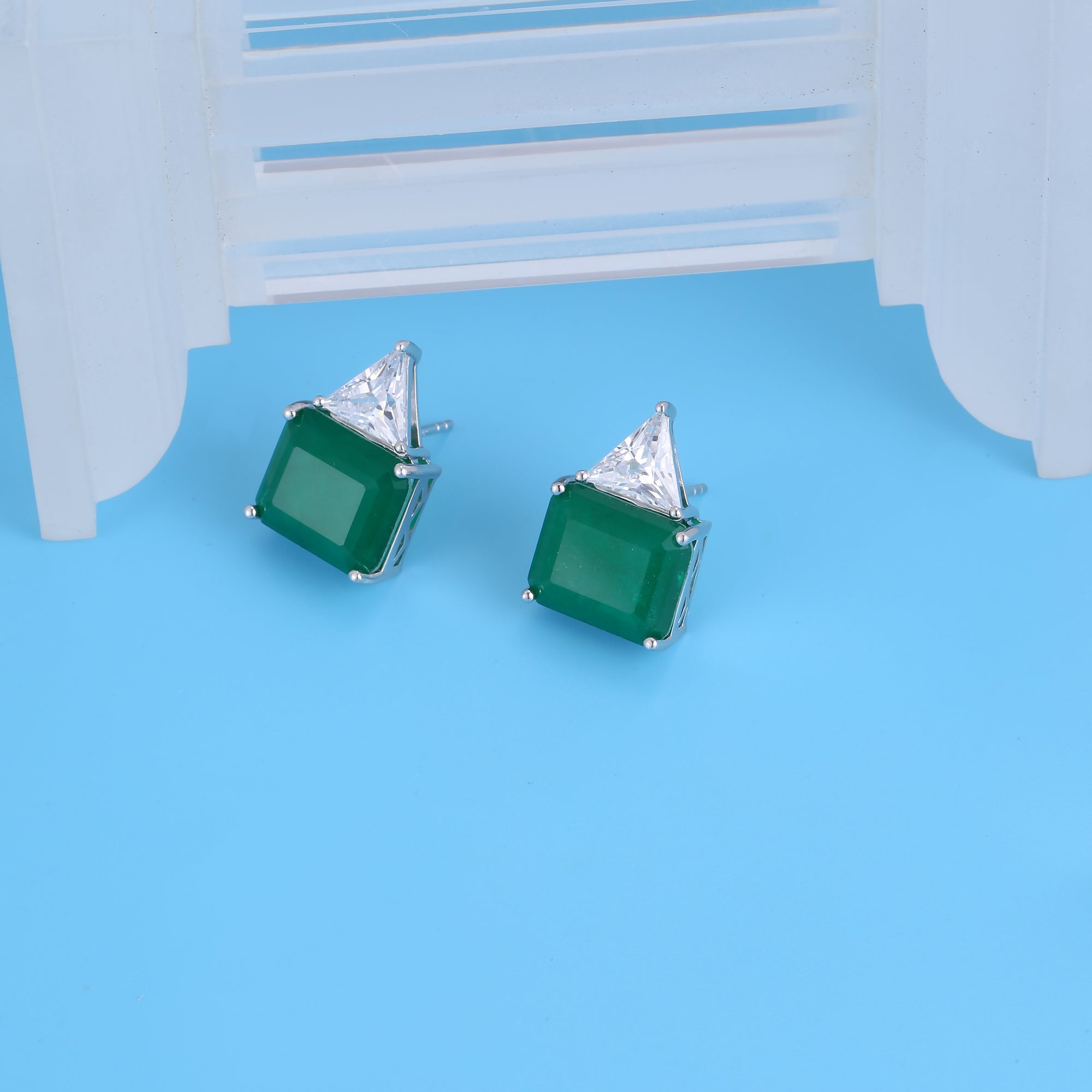 Gorgeous green emerald cutting earrings in .925 sterling silver, showcasing a rich forest green simulated emerald with brilliant sparkle.