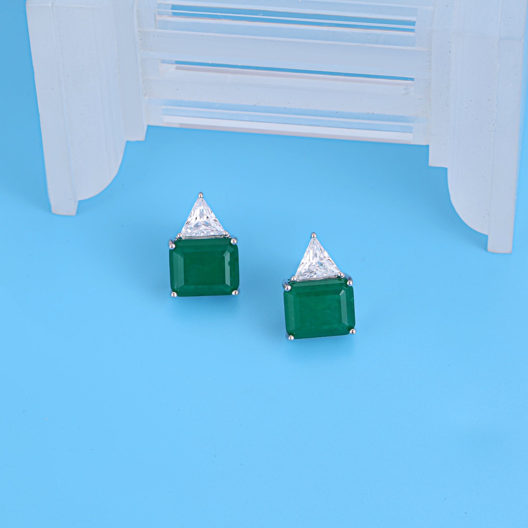 Gorgeous green emerald cutting earrings in .925 sterling silver, showcasing a rich forest green simulated emerald with brilliant sparkle.