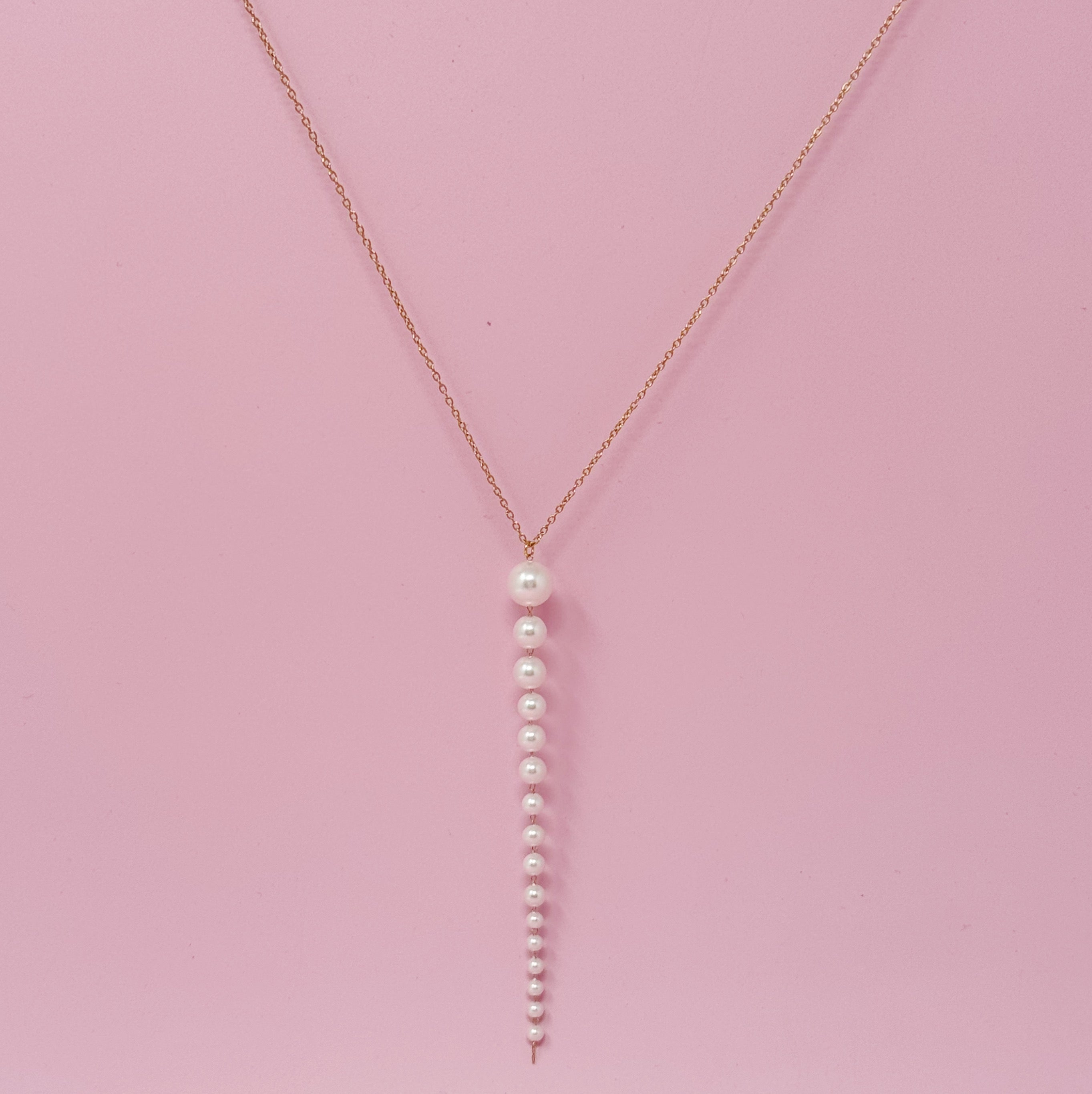 Gradiant Long Pearl Drop Necklace featuring elegant faux pearls and 18k gold plated stainless steel chain.