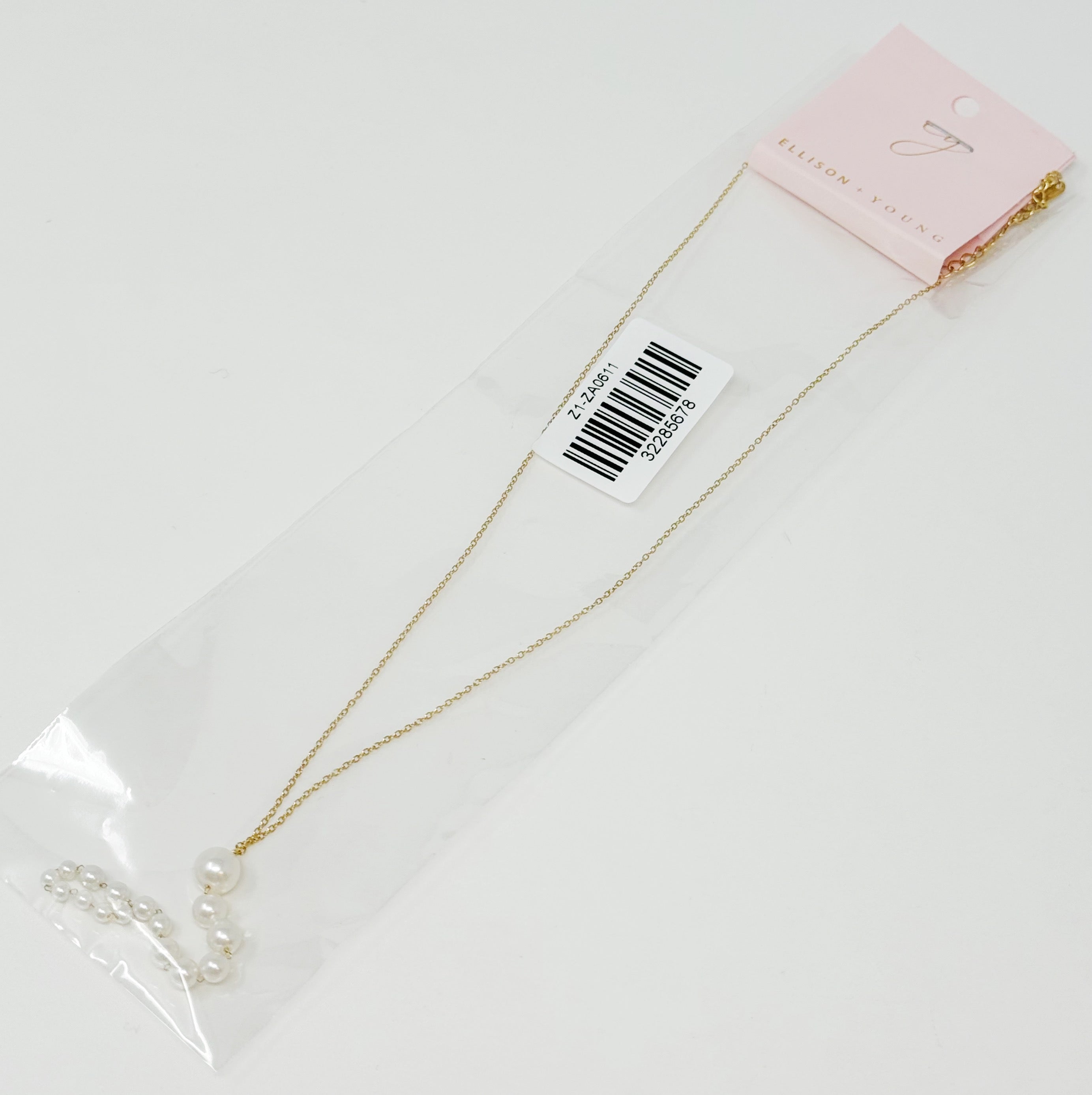 Gradiant Long Pearl Drop Necklace featuring elegant faux pearls and 18k gold plated stainless steel chain.