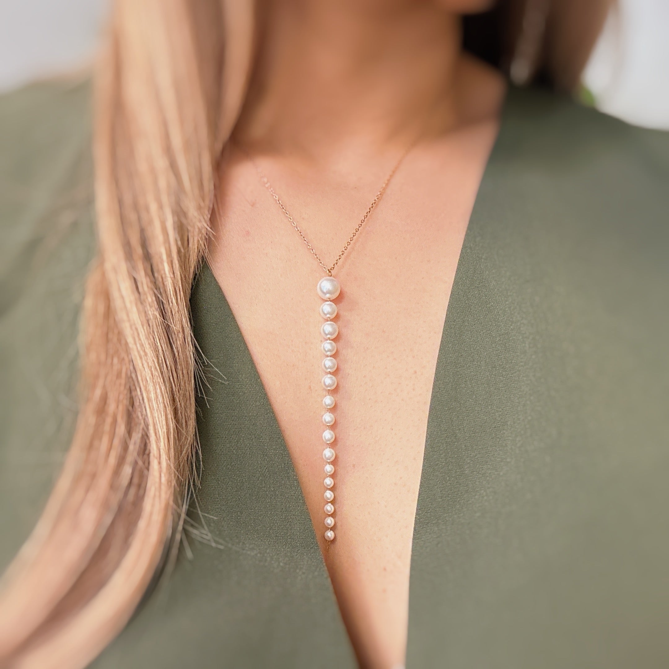 Gradiant Long Pearl Drop Necklace featuring elegant faux pearls and 18k gold plated stainless steel chain.