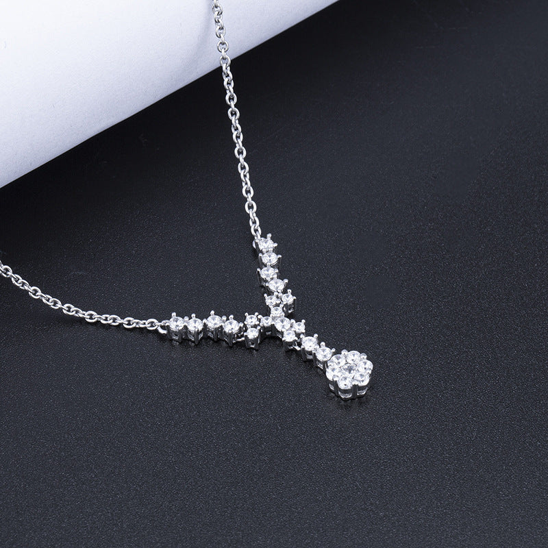 A stunning graduated brilliant simulated diamond necklace made of 925 sterling silver with real white gold filling, showcasing elegance and sparkle.