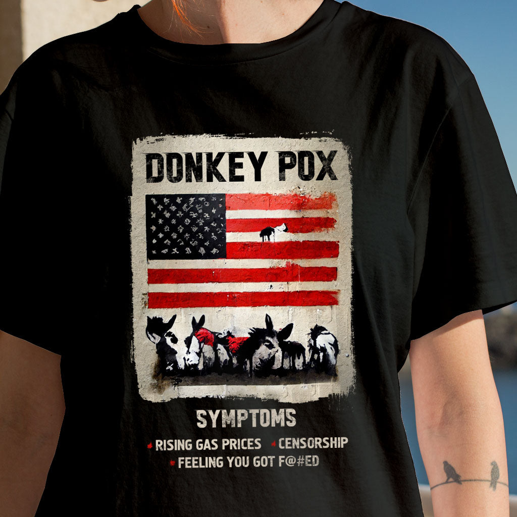 Graphic Donkey Pox T-Shirt featuring a humorous design, made from soft Airlume cotton, available in various sizes.