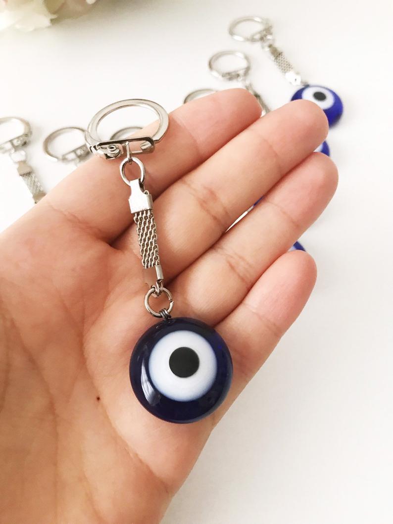 A beautiful Greek evil eye plain keychain featuring a glass evil eye bead, perfect for keys or bags.