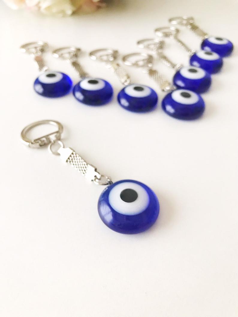 A beautiful Greek evil eye plain keychain featuring a glass evil eye bead, perfect for keys or bags.