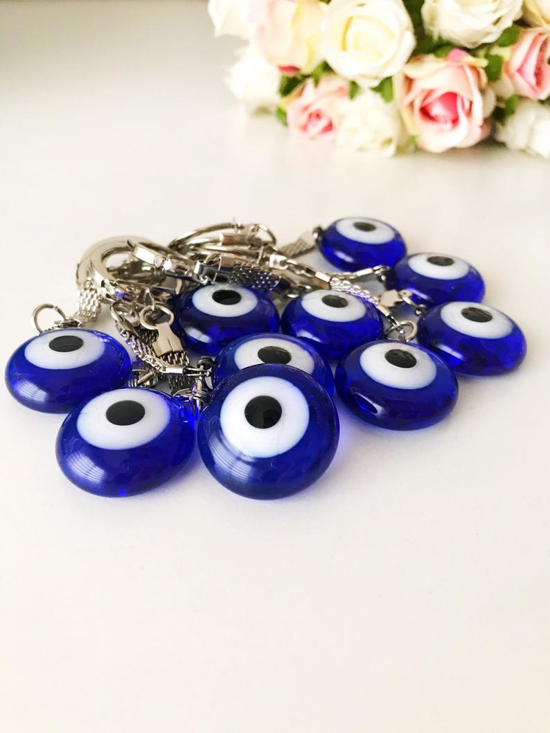 A beautiful Greek evil eye plain keychain featuring a glass evil eye bead, perfect for keys or bags.