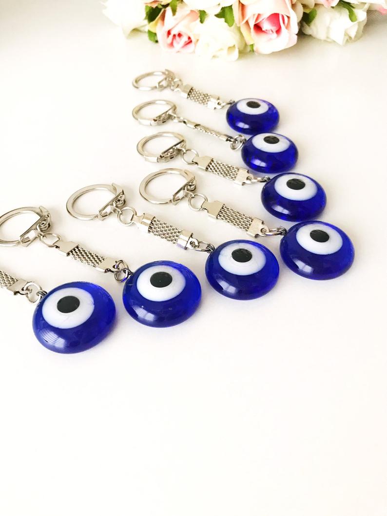 A beautiful Greek evil eye plain keychain featuring a glass evil eye bead, perfect for keys or bags.