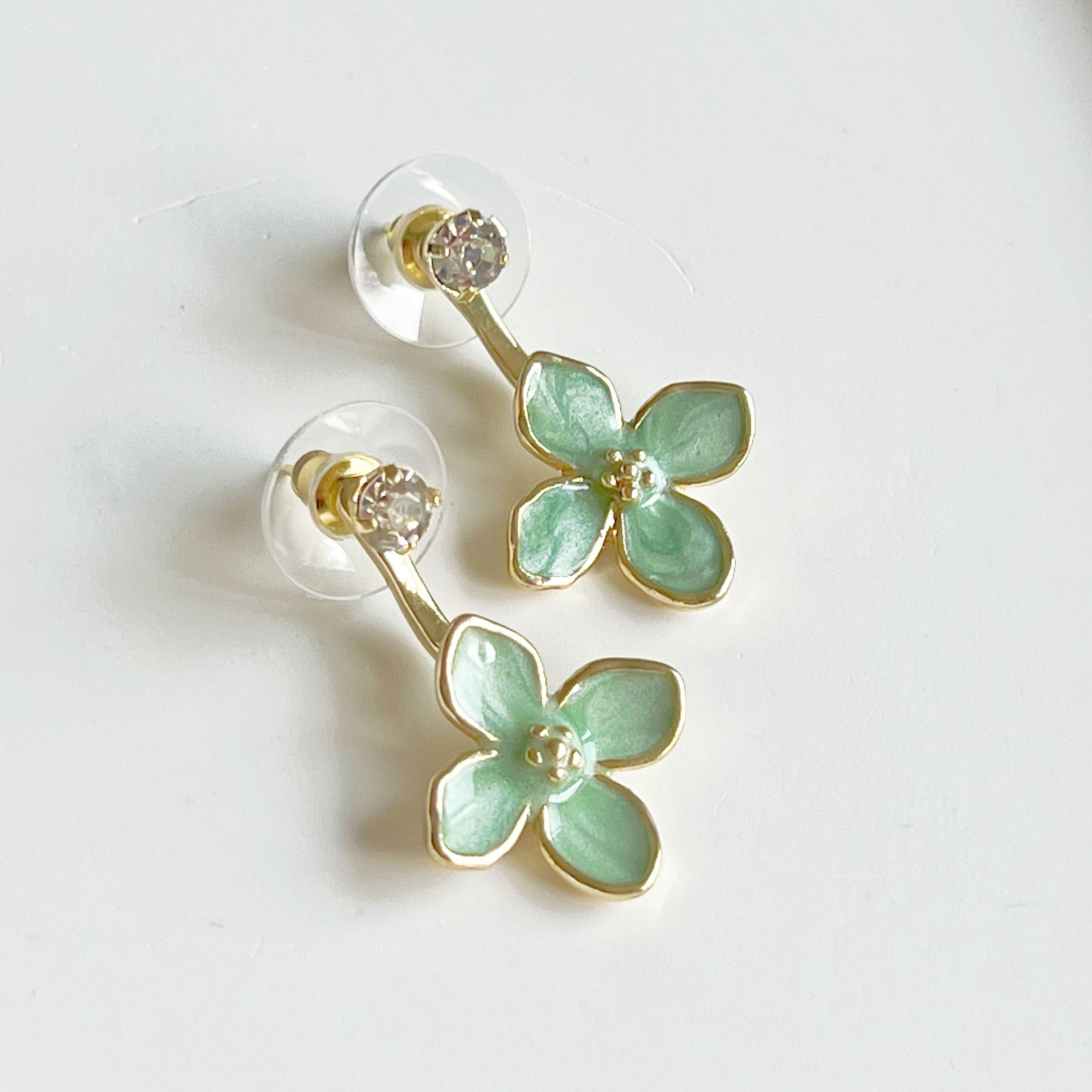 Elegant green hydrangea flower ear jacket earrings with gold-plated bronze and sterling silver studs, showcasing a unique floral design.