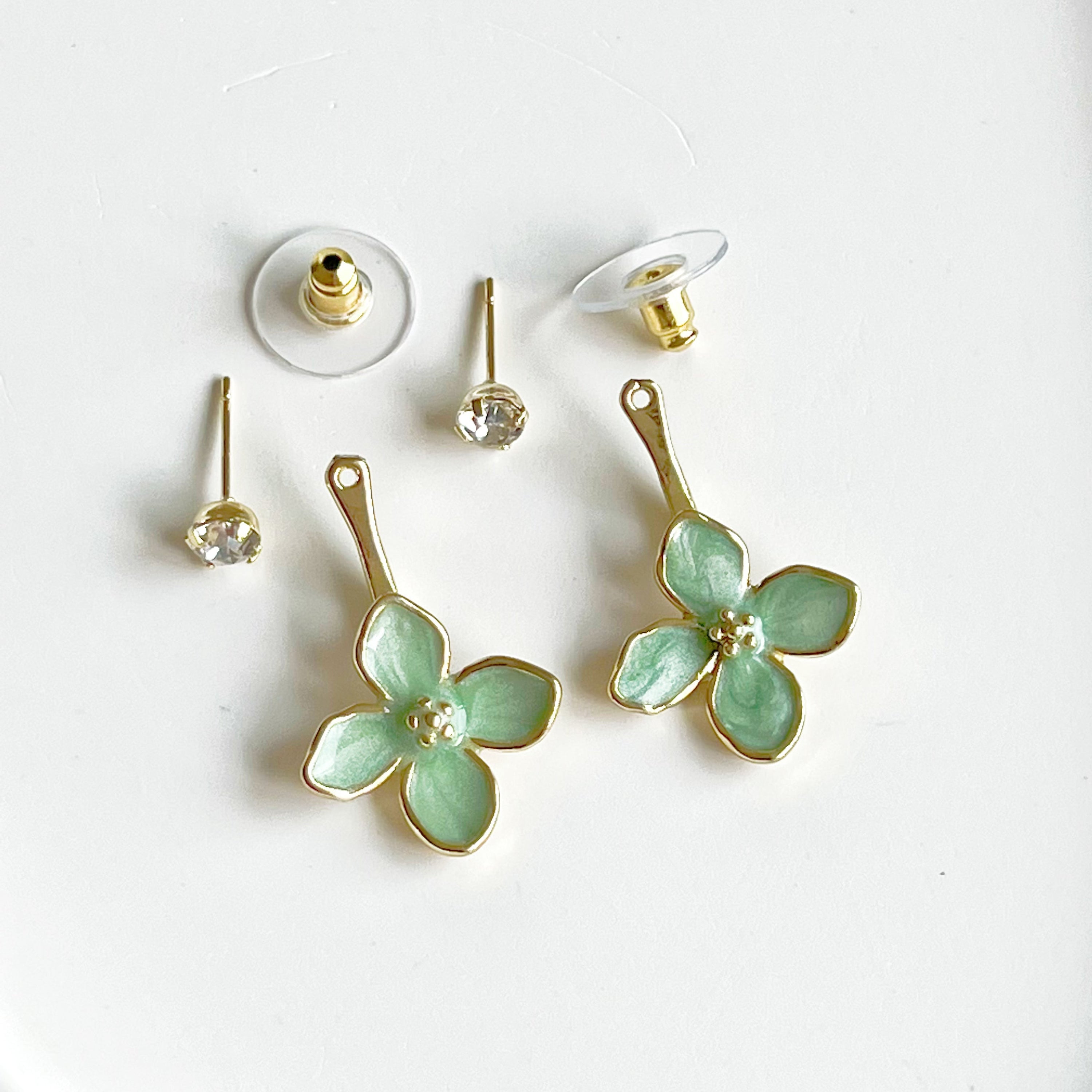 Elegant green hydrangea flower ear jacket earrings with gold-plated bronze and sterling silver studs, showcasing a unique floral design.