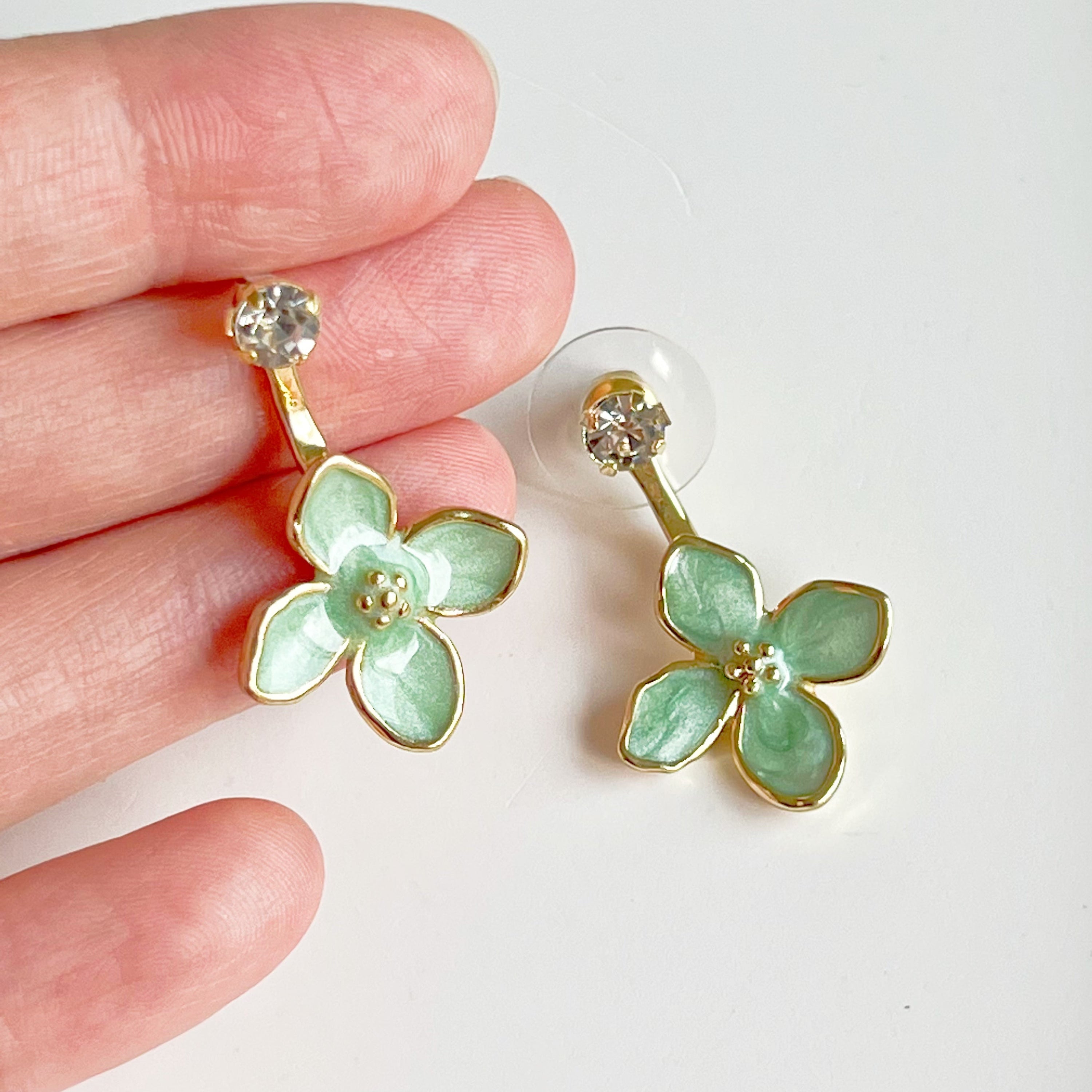 Elegant green hydrangea flower ear jacket earrings with gold-plated bronze and sterling silver studs, showcasing a unique floral design.