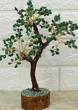 A beautifully hand-carved Green Jade Gemstone Tree featuring 300 unique jade chips, symbolizing good fortune and luck.