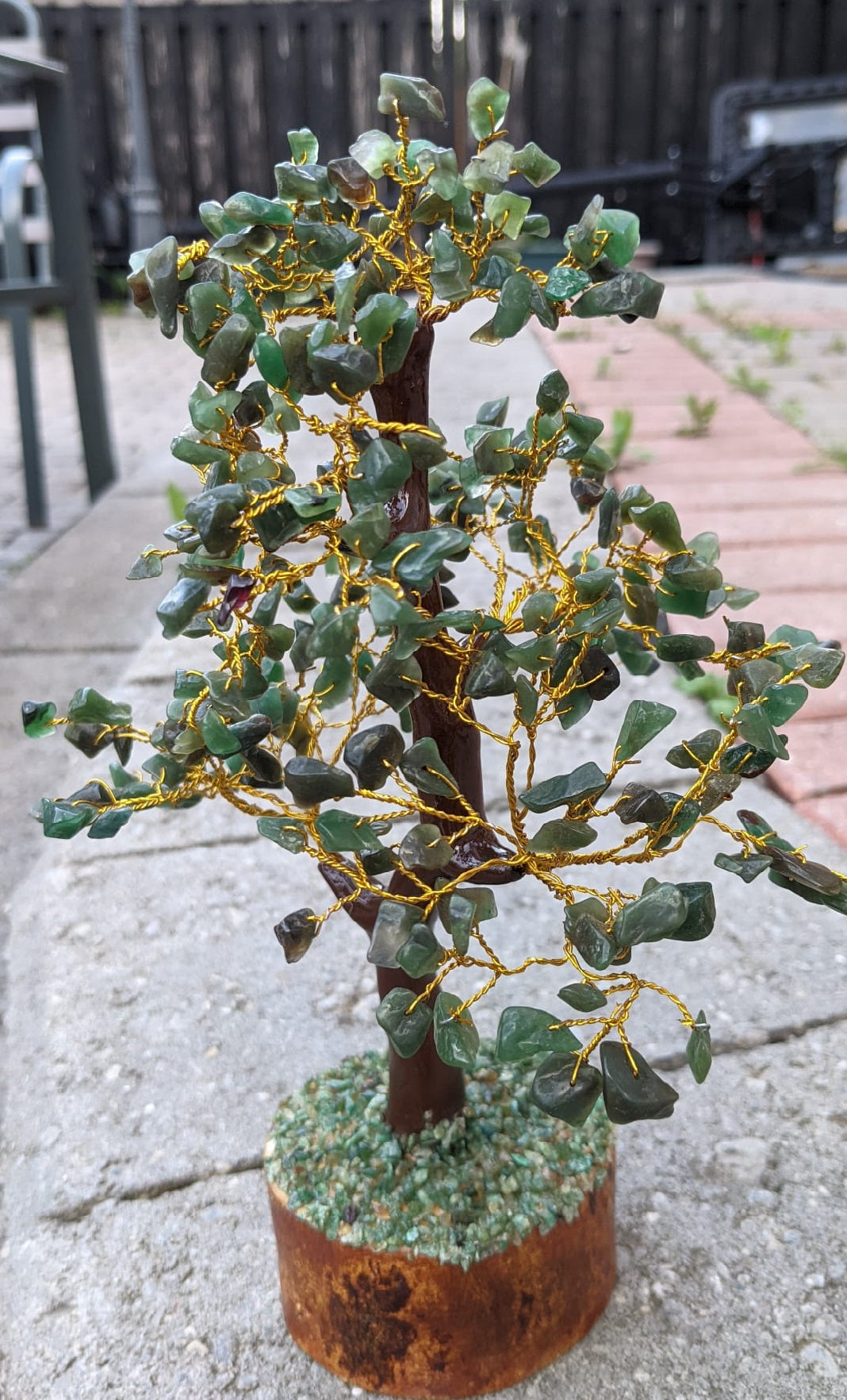 A beautifully hand-carved Green Jade Gemstone Tree featuring 300 unique jade chips, symbolizing good fortune and luck.