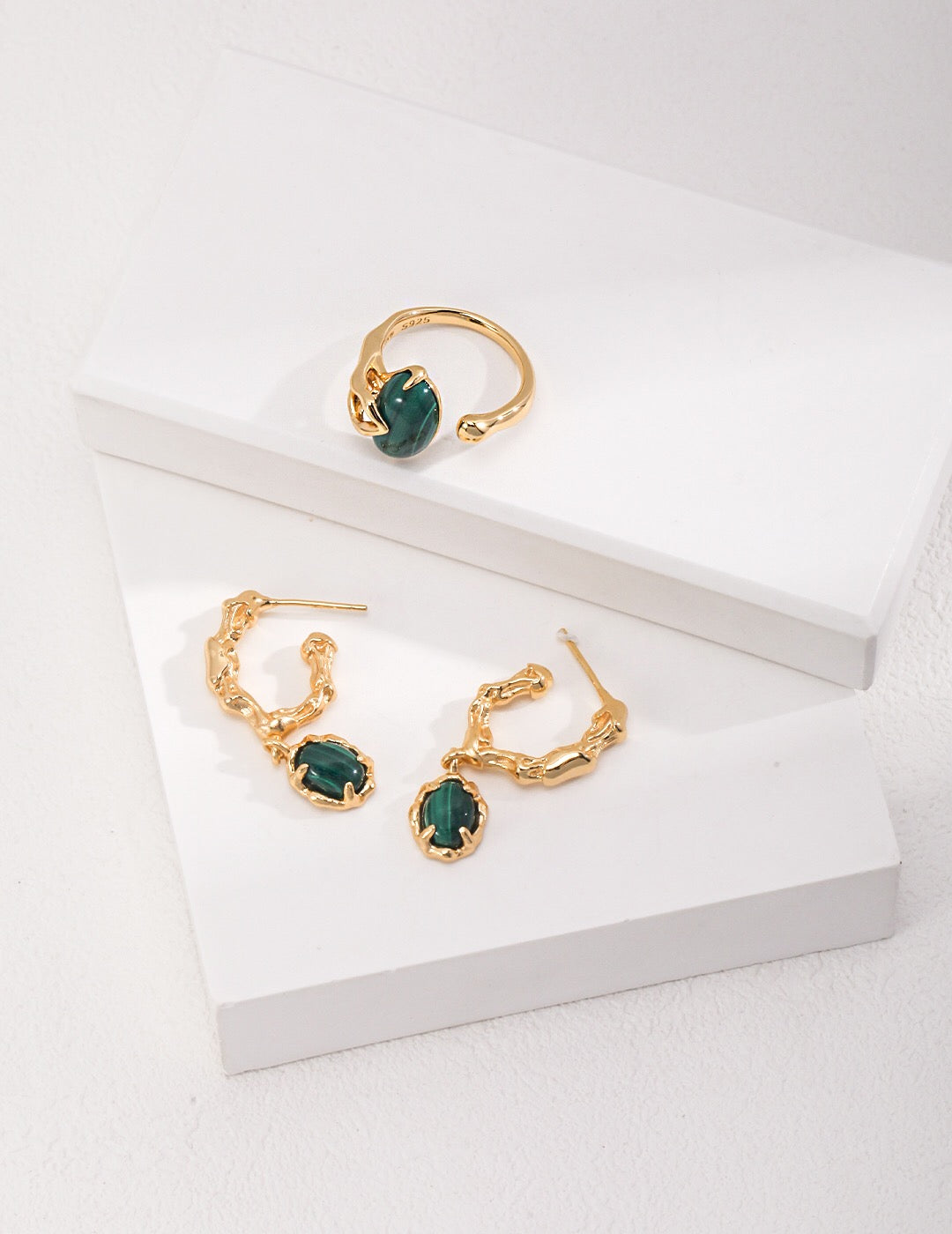 Elegant Green Malachite Hoop Earrings featuring gold vermeil accents, showcasing vibrant green hues and unique patterns.