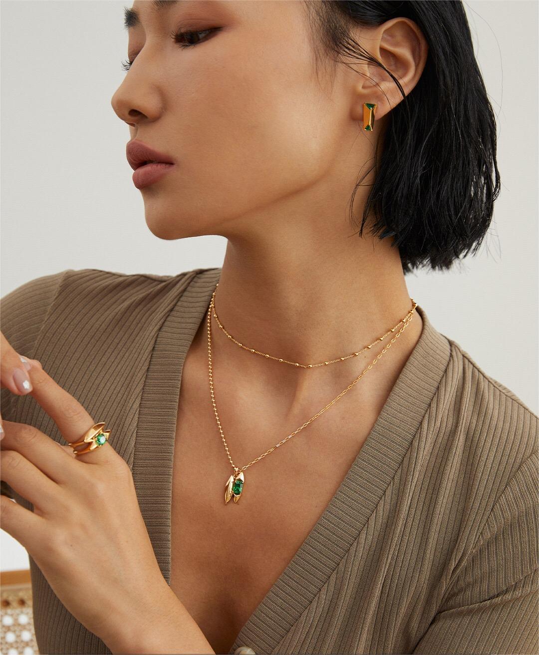 Elegant Green Zircon Necklace featuring a vibrant zircon stone set in gold vermeil over sterling silver, showcasing its handcrafted beauty.