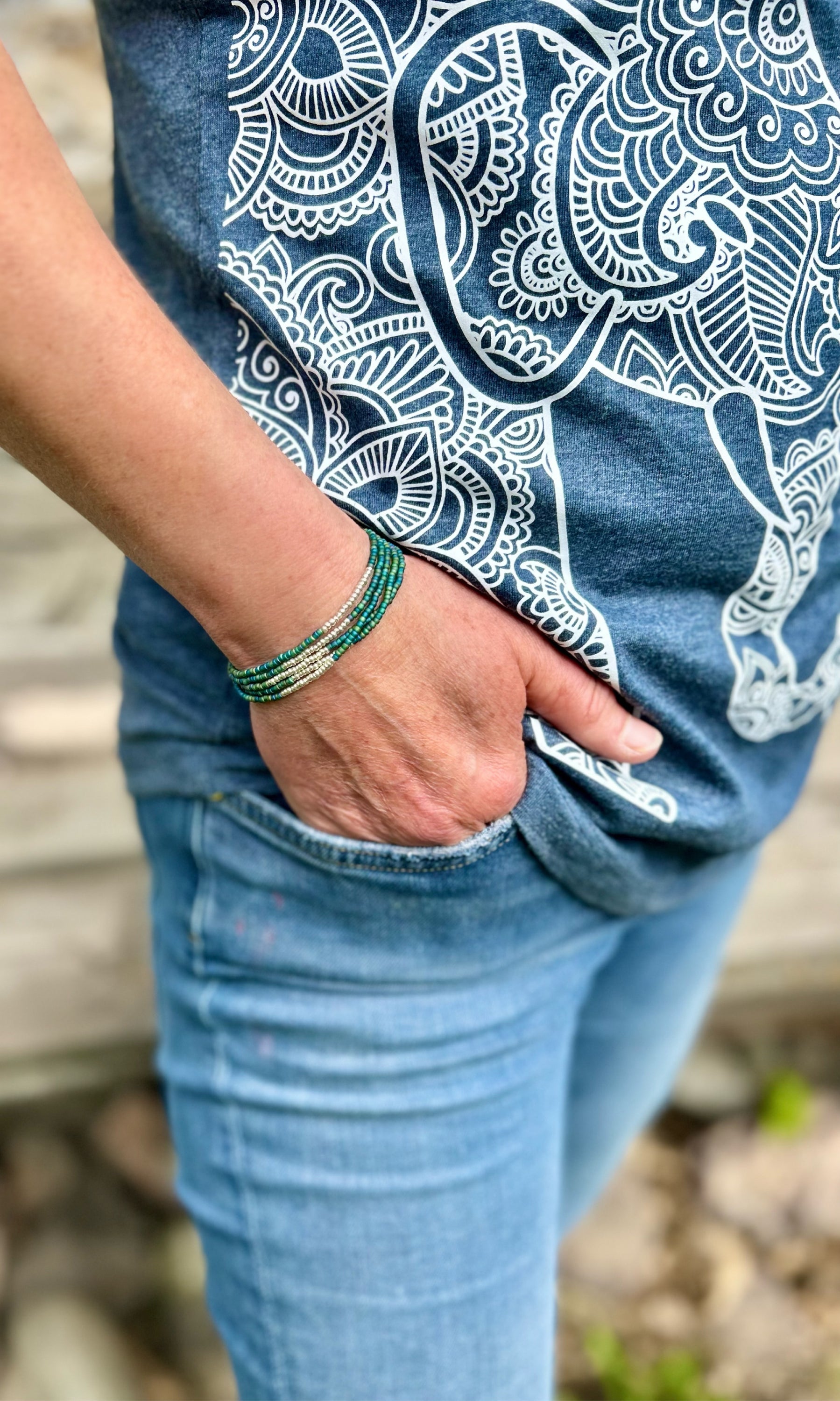 Greenish-blue 5-wrap beaded bracelet with silver stripes, showcasing Czech glass seed beads and strong elastic cording.