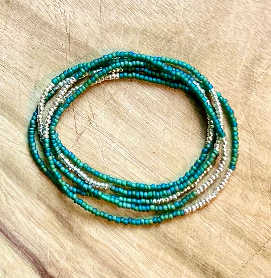 Greenish-blue 5-wrap beaded bracelet with silver stripes, showcasing Czech glass seed beads and strong elastic cording.