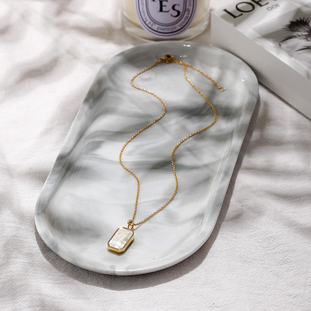 GRID Natural Shell Pendant Necklace featuring an elegant opal design and a delicate 14k gold chain, perfect for daily wear.