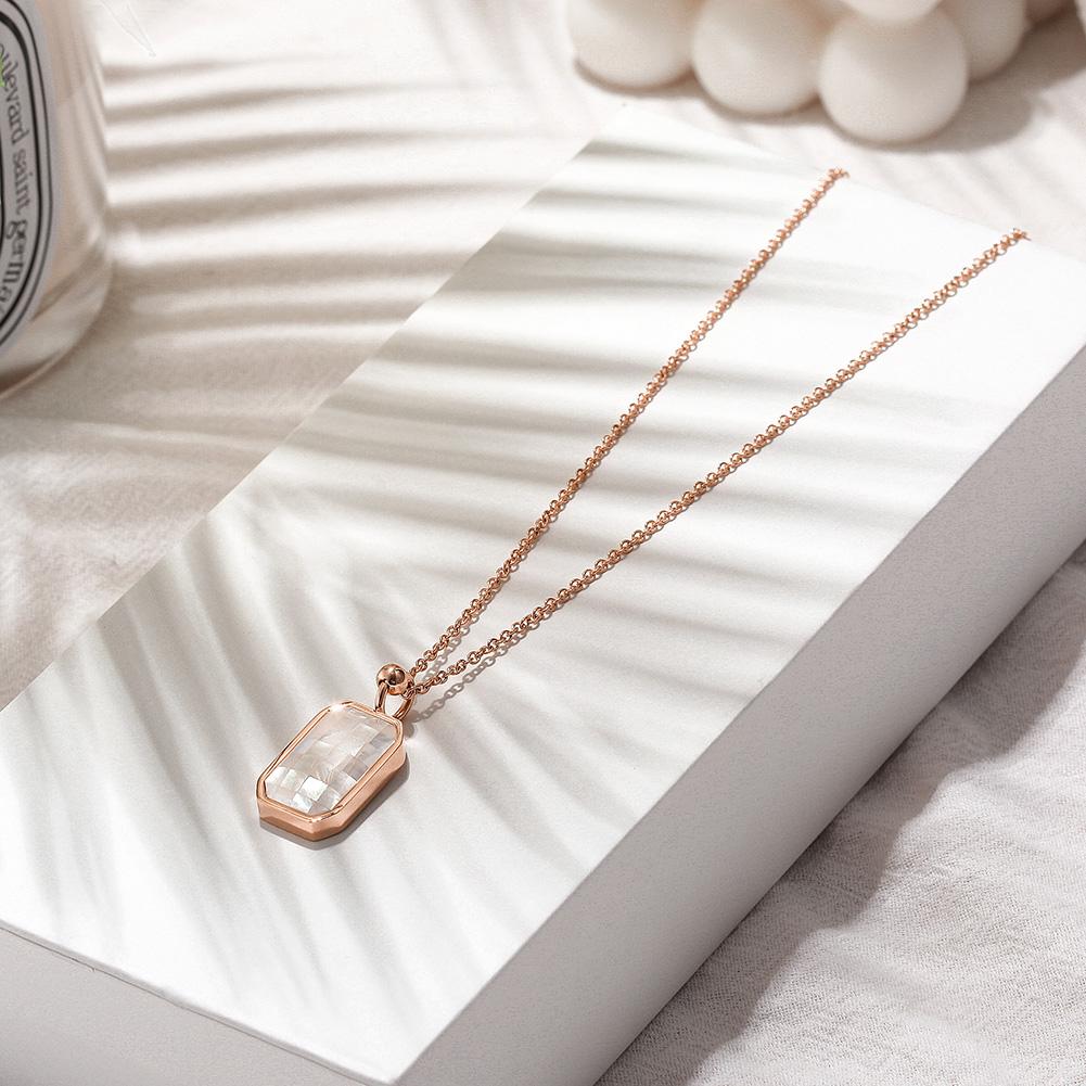 GRID Natural Shell Pendant Necklace featuring an elegant opal design and a delicate 14k gold chain, perfect for daily wear.