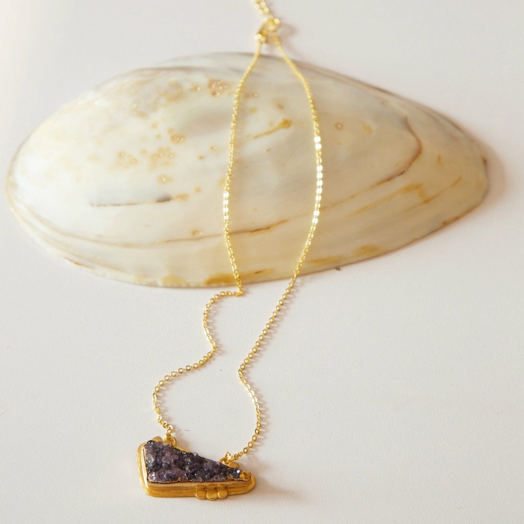 Handmade Guardian Amethyst Pendant featuring natural Amethyst stone on an 18K gold plated chain, showcasing its unique craftsmanship.