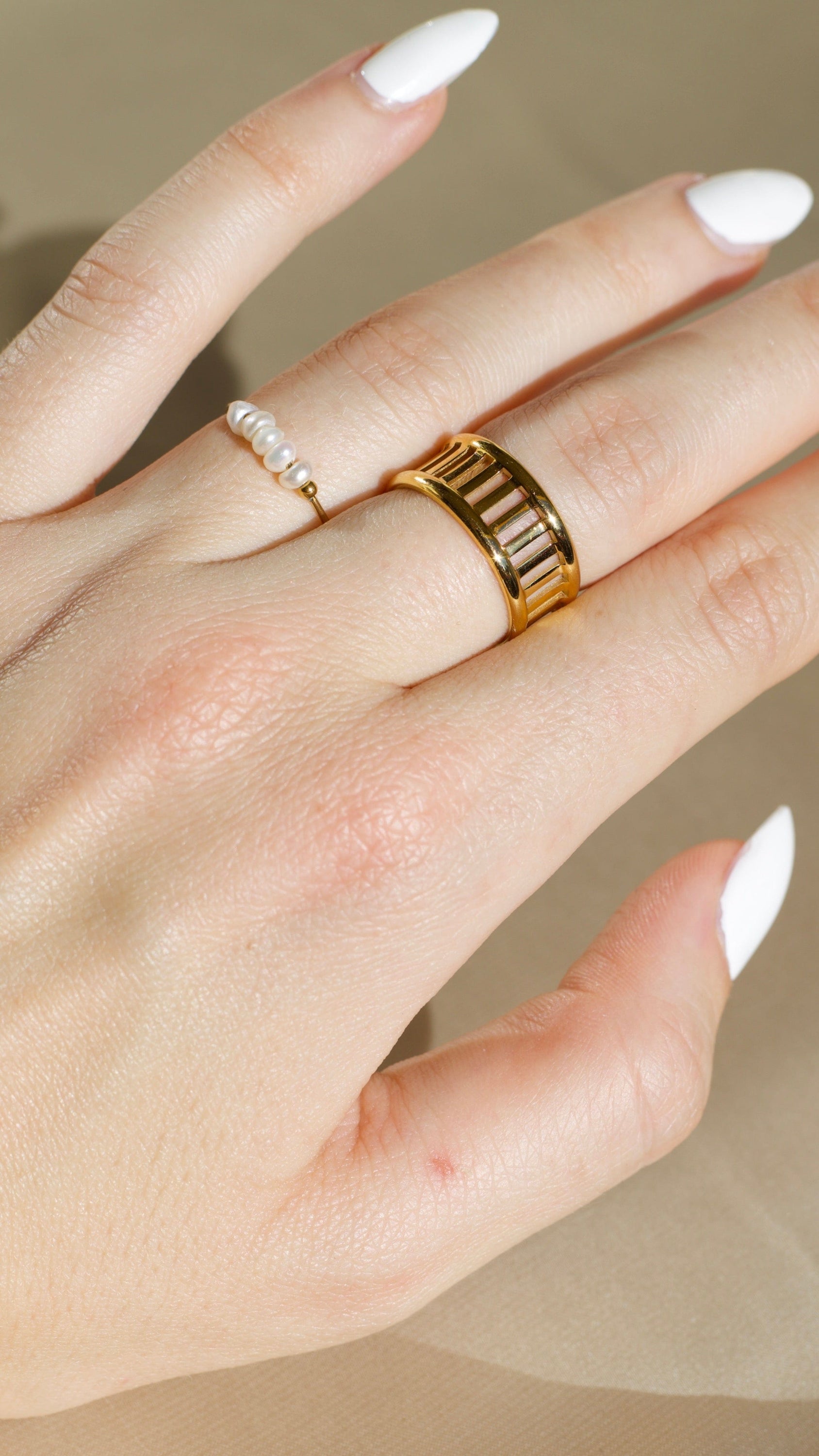 Gurk Pearl Ring Gold featuring a minimalist geometric design with genuine freshwater seed pearls and 18k gold plating.