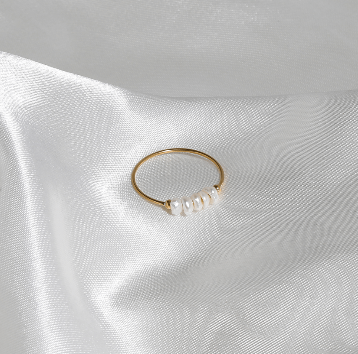 Gurk Pearl Ring Gold featuring a minimalist geometric design with genuine freshwater seed pearls and 18k gold plating.