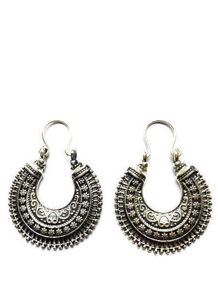 A pair of handmade Gypsy Earrings featuring intricate patterns, silver plated hypoallergenic brass, elegantly designed for stylish wear.