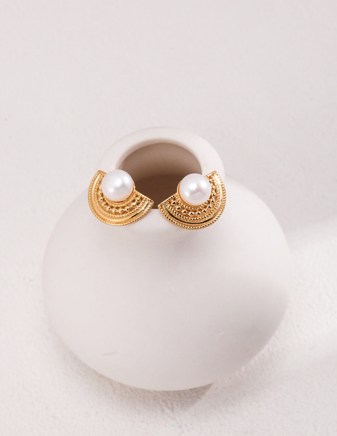 Elegant Half Circle Pearl Stud Earrings made of natural pearls and sterling silver, showcasing a luxurious gold vermeil finish.