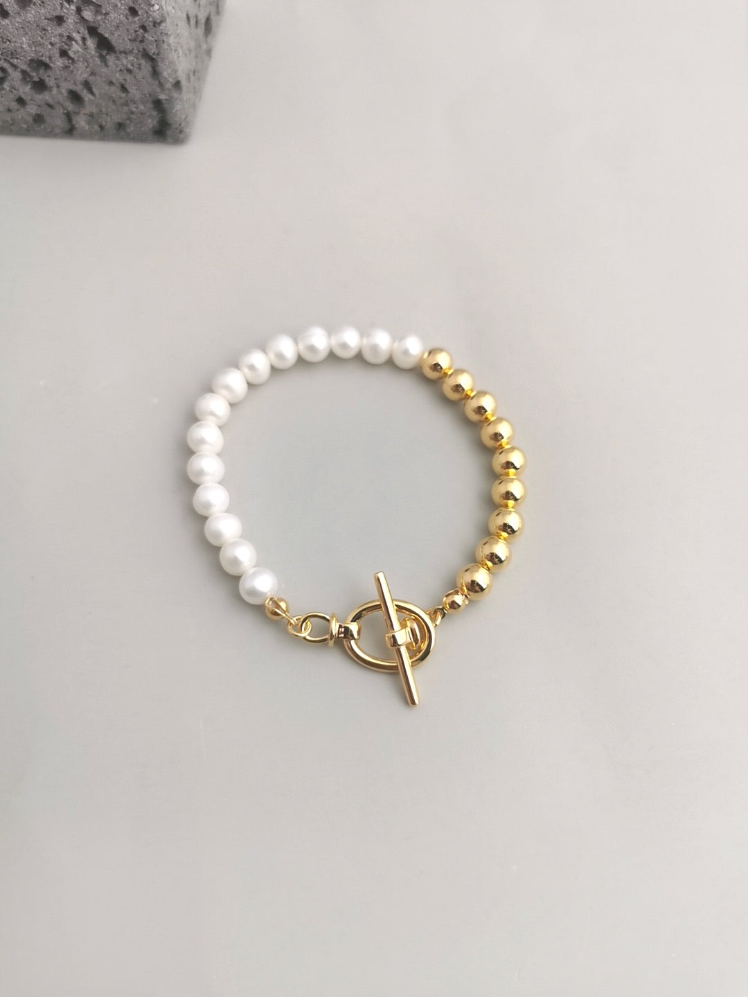 Half Pearl Half Bead Toggle Bar Bracelet featuring natural pearls and gold vermeil, elegantly designed for a sophisticated look.