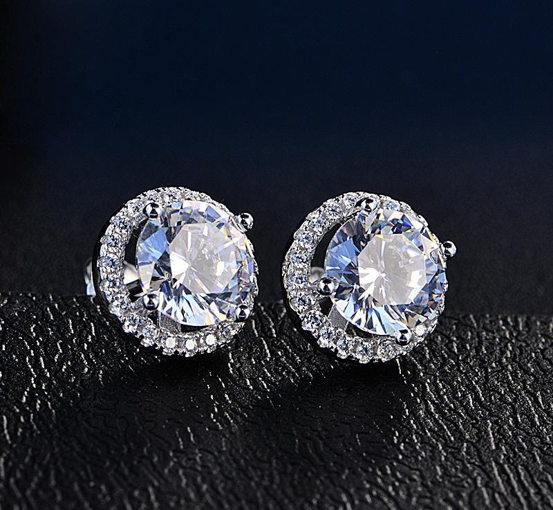 Elegant Halo Stud Earrings featuring sparkling Austrian Crystals, beautifully designed with 18K white gold plating.