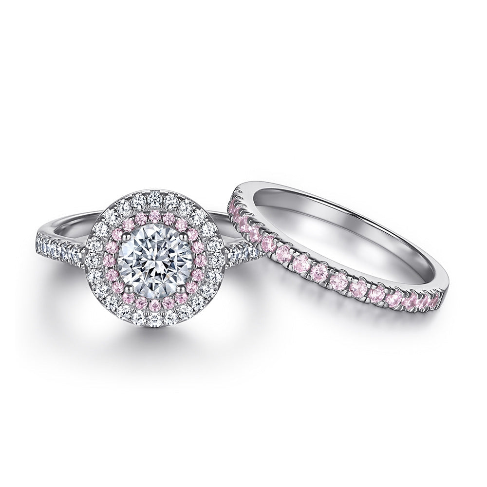 Halo wedding set featuring 925 sterling silver and real white gold, adorned with white sapphire and pink zirconia stones.