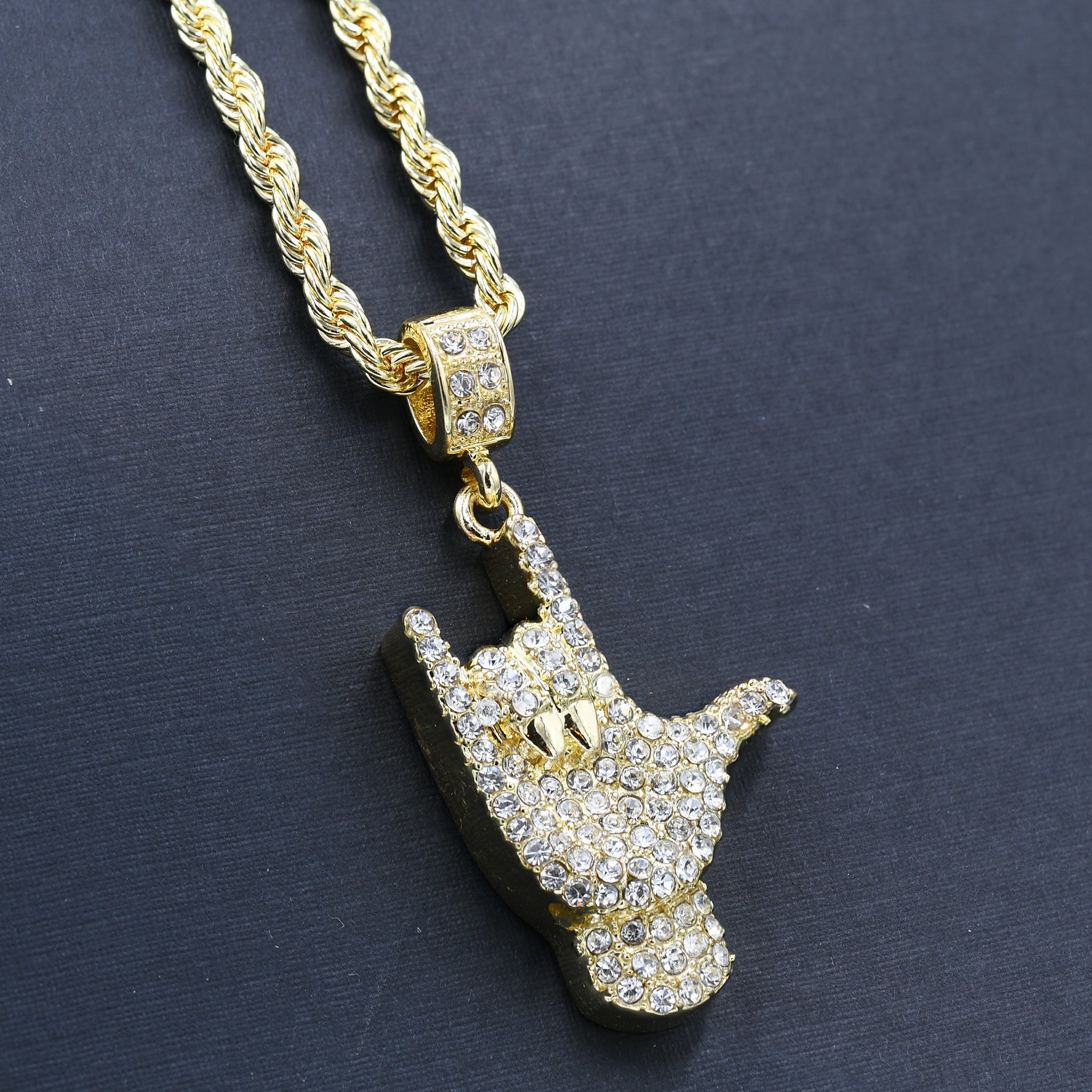 HAND CHAIN AND CHARM - HC1234G featuring a crystal-studded pendant on a 24'' rope chain, perfect for hip-hop fashion.