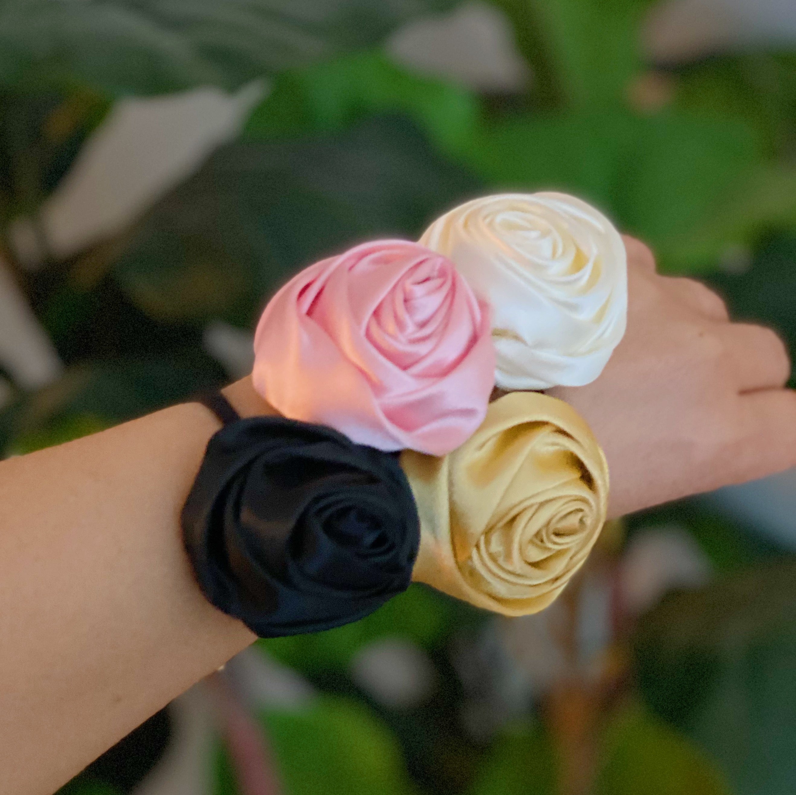 Hand Picked Satin Rose Hair Tie Set of 4 in neutral colors, featuring elegant rose-shaped designs.