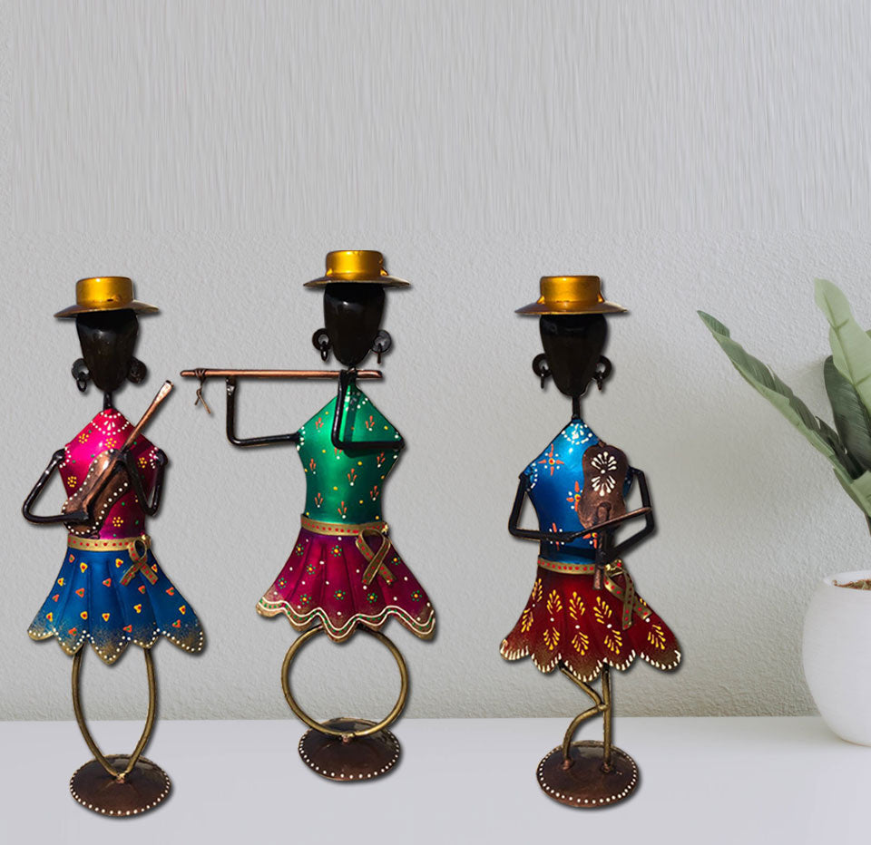 Set of 3 handcrafted musical dancing dolls made from wrought iron, showcasing vibrant colors and intricate details.