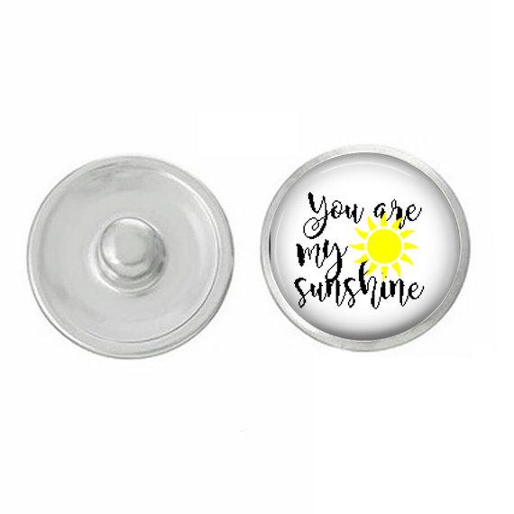 Hand-pressed You Are My Sunshine Snap featuring vibrant colors and unique design, perfect for jewelry lovers.