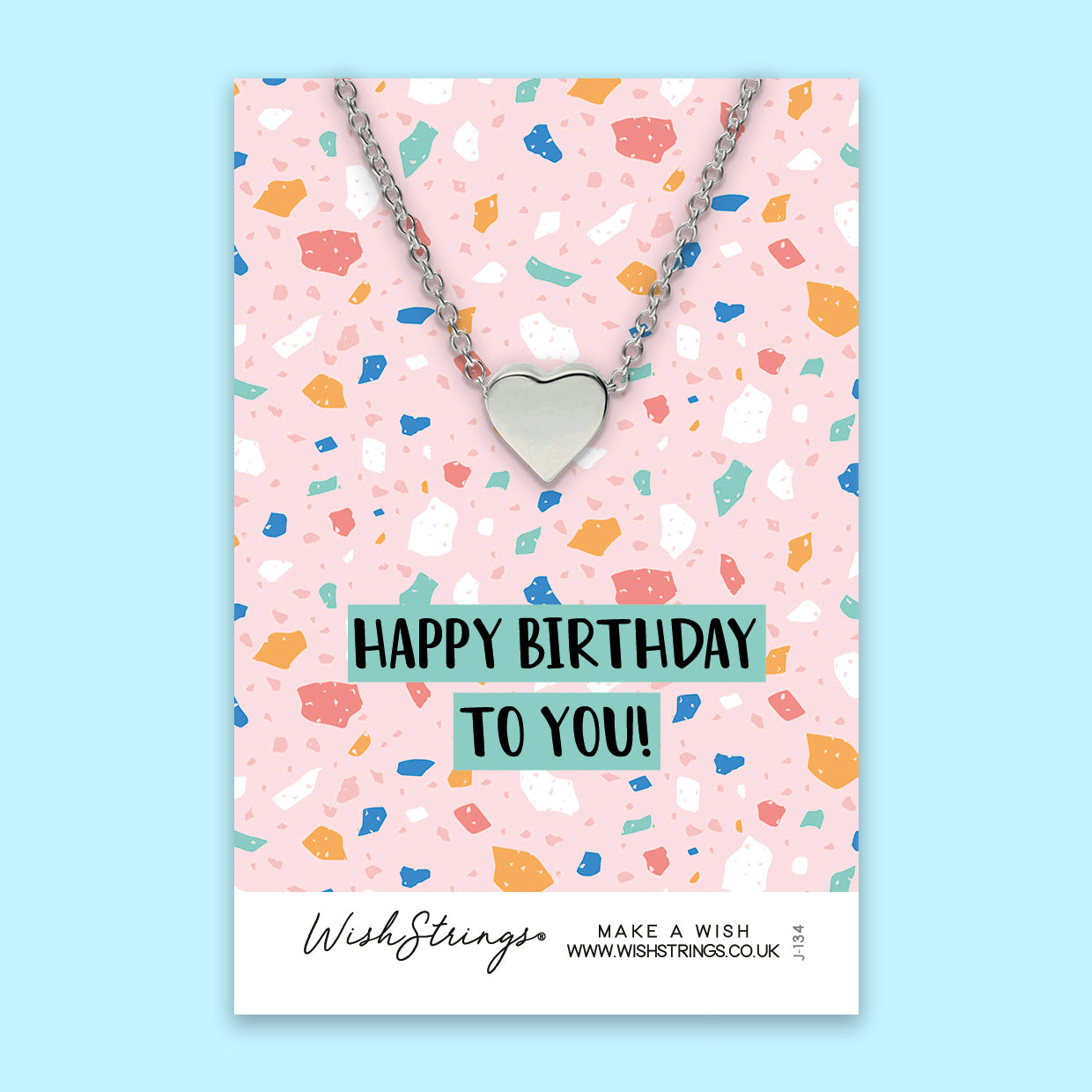 Happy Birthday Heart Necklace, handmade in the UK, featuring a delicate heart design on a silver chain.