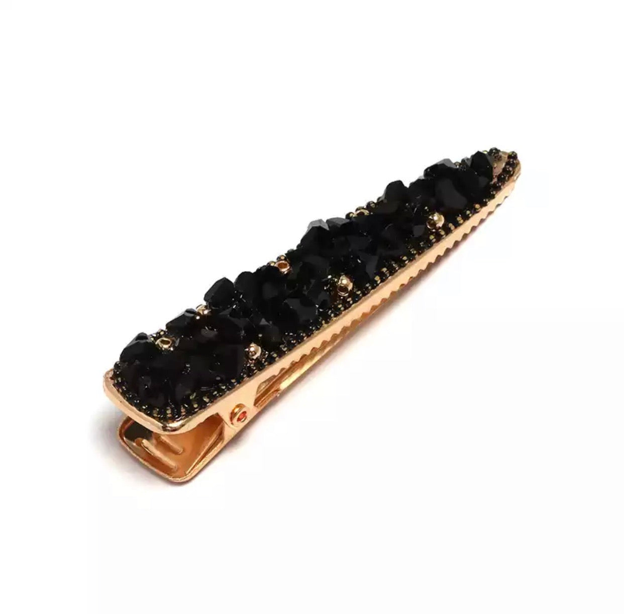 Harlowe Barrette, a luxe hair clip with sparkling details, perfect for adding elegance to any hairstyle.