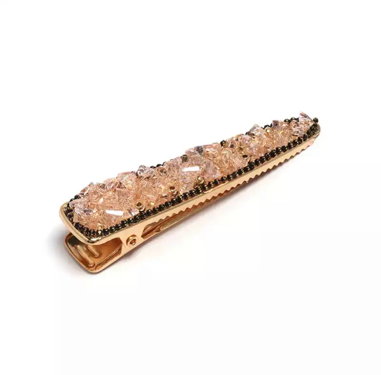 Harlowe Barrette, a luxe hair clip with sparkling details, perfect for adding elegance to any hairstyle.