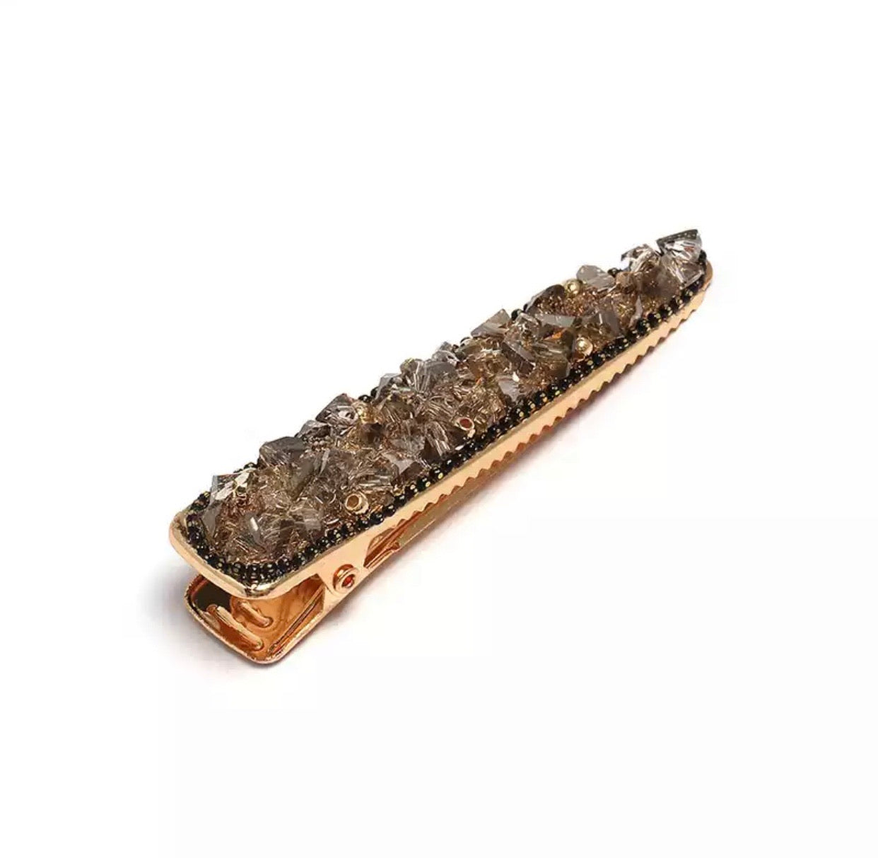 Harlowe Barrette, a luxe hair clip with sparkling details, perfect for adding elegance to any hairstyle.