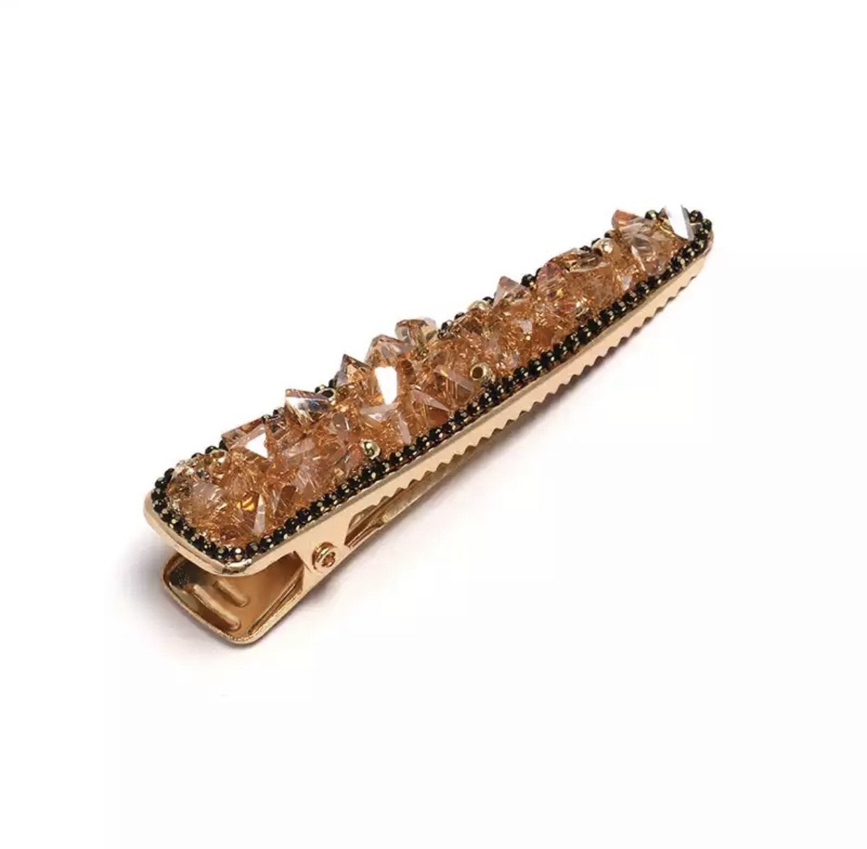 Harlowe Barrette, a luxe hair clip with sparkling details, perfect for adding elegance to any hairstyle.