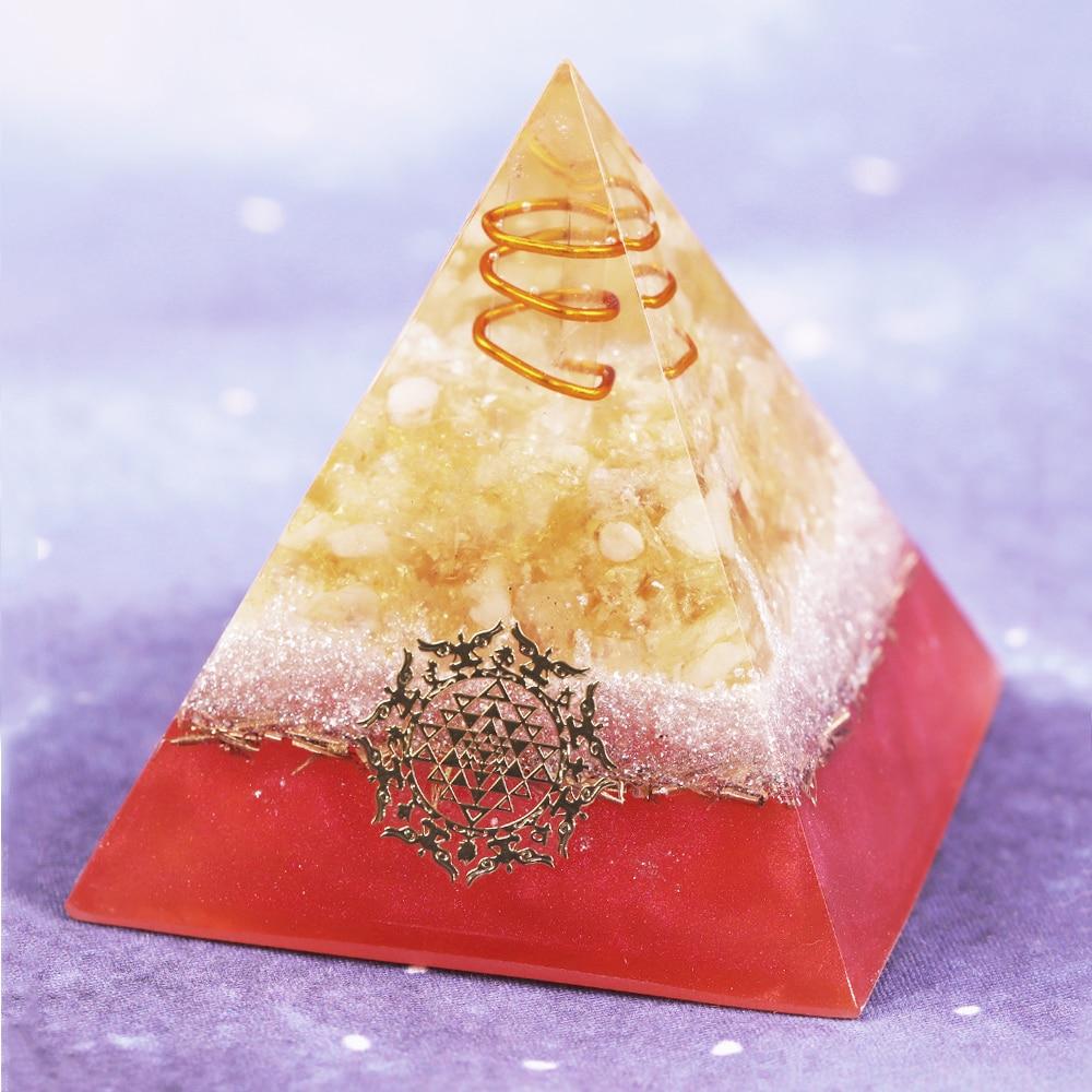 Healing Crystal Orgone Pyramid featuring copper wire, made from natural citrine and resin, designed for EMF protection and meditation.